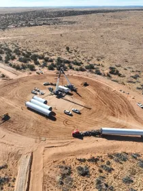 aerial-wind-turbine-construction-desert-west-camp-2.png