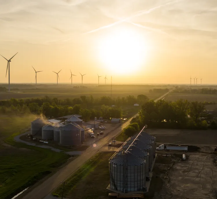wind-turbines-and-grain-silos-at-sunset.jpg