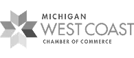 Logo of Michigan West Coast Chamber of Commerce featuring a stylized star design.