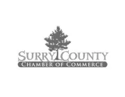 Logo of Surry County Chamber of Commerce featuring a tree silhouette above the text.